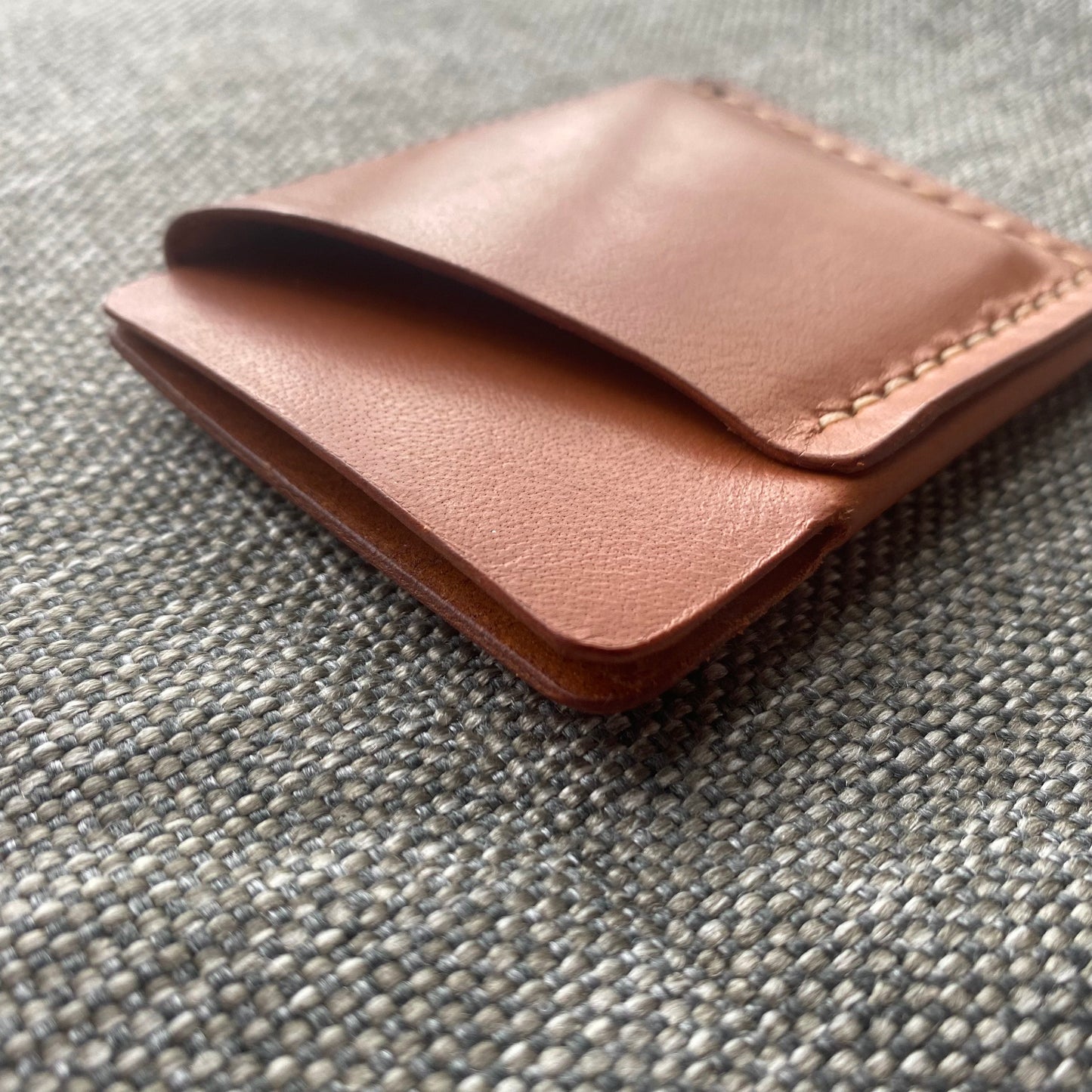 Handmade leather cardholder in windsor tan, detail view of card slots